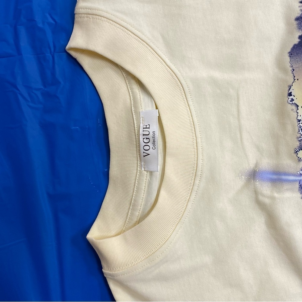 Vogue Cream and Blue Graphic Tee​​ - Picture 3 of 3